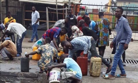 Residents scoop fuel as petrol tanker falls in Lagos