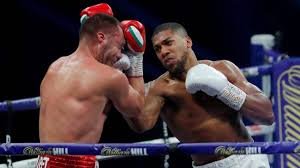 Anthony Joshua beats Pulev to retain world heavyweight titles