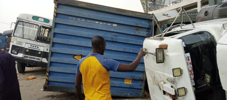 Passengers Escape As Container-Laden Truck Falls In Oshodi