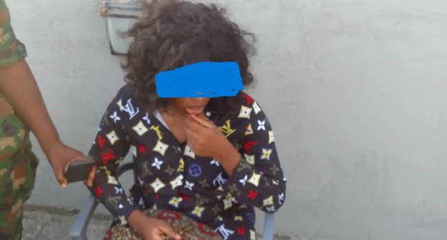 Army Rescues Lady From Plunging Into Lagos Lagoon