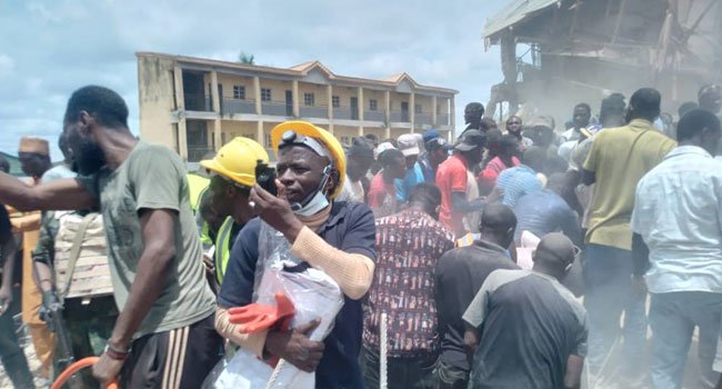 PHOTOS: Emergency Workers Battle To Rescue Trapped Persons In Plateau Building Collapse